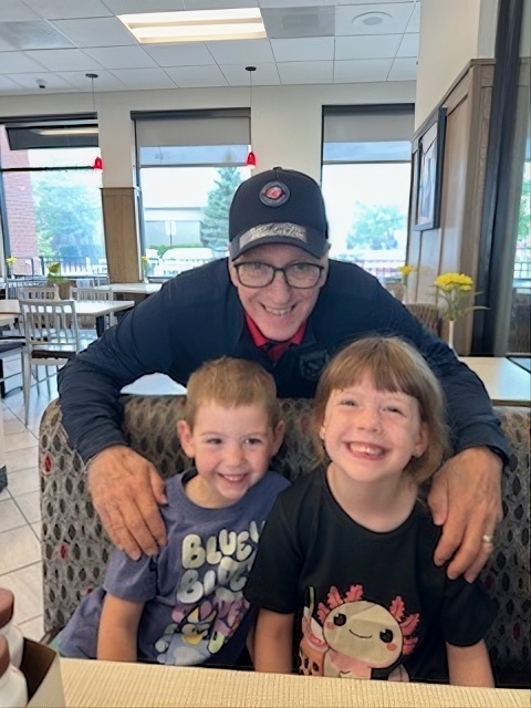 Tim with two new happy customers
